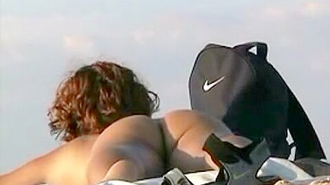 Bunch of cute chicks caught naked on the beach | watch  HD voyeur camera xxx movie for free