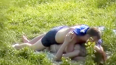 Lovers making love on the grass gets secretely taped | watch  HD hidden cam sex movie for free