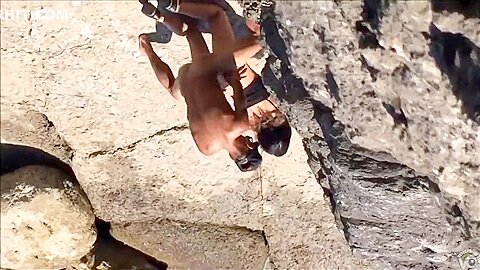 Filly's pussy gets penetrated on the rocky beach | watch  HD voyeur cam sex video for free