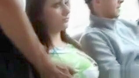 Busty brunette girl gets groped by stranger while riding the bus | watch  HD candid cam xxx video for free