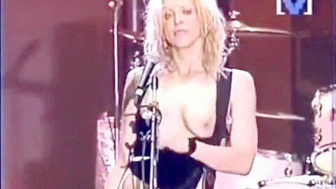 Hot rockstar plays a song with her boobs out in the open | watch  HD hidden cam sex movie for free