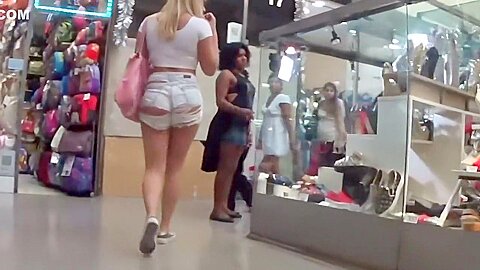 Blonde looks seductive in torn shorts | watch  HD spy cam xxx movie for free