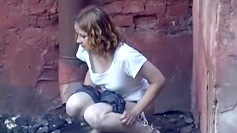 Girl pees in public next to old buildind | watch  HD hidden camera xxx video for free