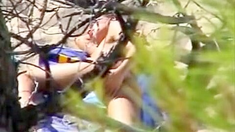 Aroused girl rubbing her pussy on a beach | watch  HD spy camera porn movie for free