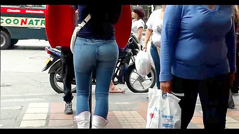 a beautiful round ass in jeans talking at a public phone | watch  HD candid camera porn video for free