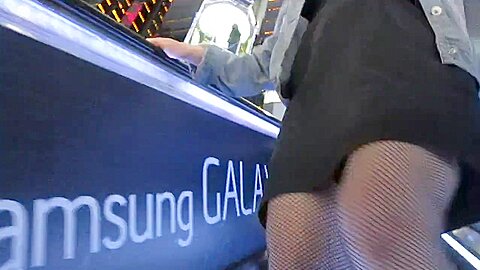 Flashing fishnet stockings tops on escalator | watch  HD spy cam porn video for free
