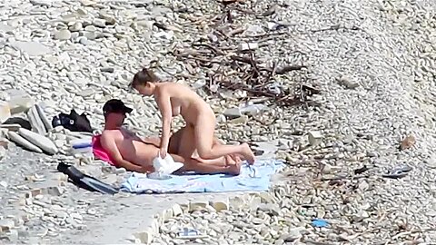 Couple fucked on a public beach while as people walked near | watch  HD spy cam porn video for free