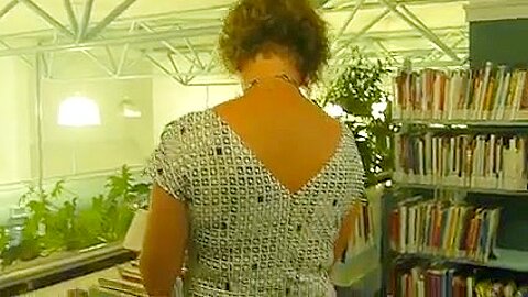 MILF upkskirt in the library | watch  HD spy camera porn video for free