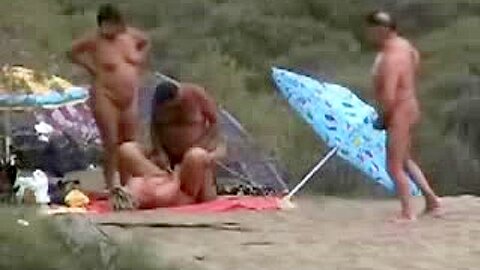 Two mature couples having fun at nude beach | watch  HD spy cam xxx video for free