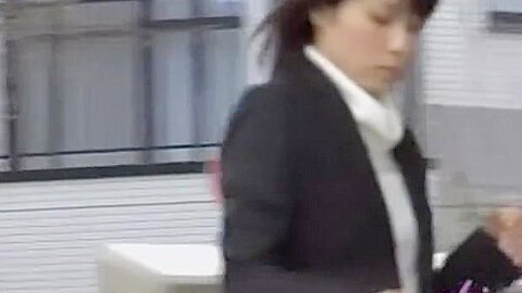 Japanese businesswoman loses a skirt during street sharking. | watch  HD candid camera sex video for free