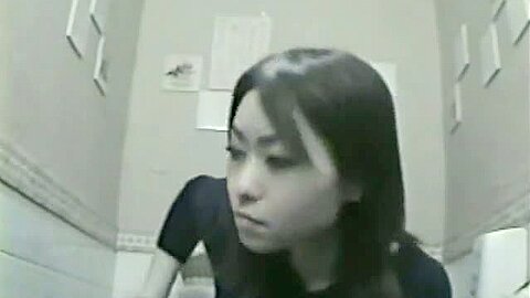 Nice asian woman is caught on camera while pissing in toilet | watch  HD spy camera sex movie for free