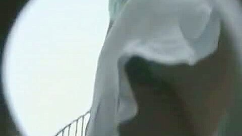 Two nice yound butts shot up skirt in a shopping center | watch  HD candid camera sex video for free