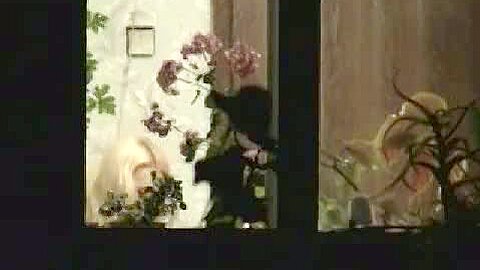 Stunning mature bitch is dressing up by the window | watch  HD hidden cam sex movie for free