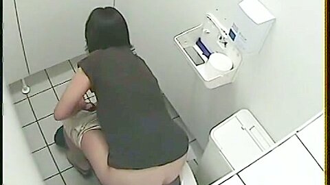 A pissing girl is exposed to a toilet voyeur cam | watch  HD spy cam sex video for free
